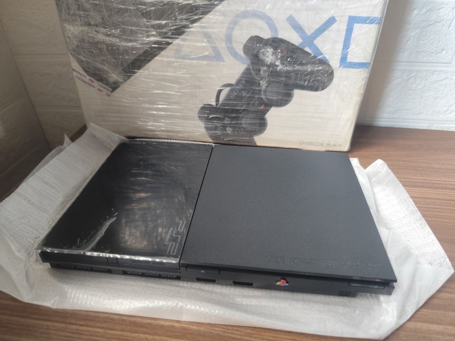 Новая PS2 SLIM..