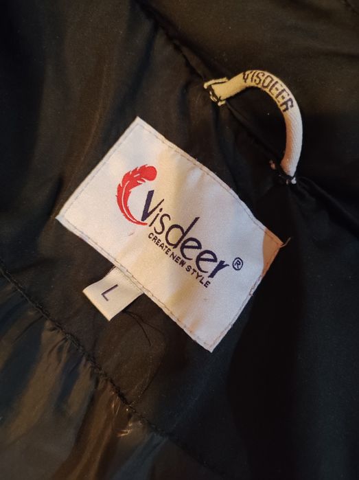 Продам зимнюю куртку на девушку.