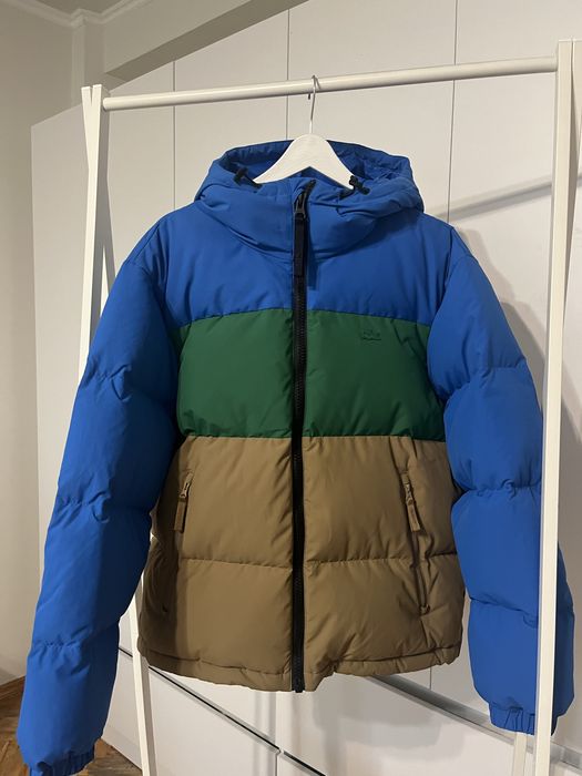 Пуховик бренда Lacoste