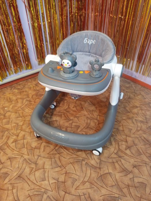 Брэндовый ходуночек детям .
