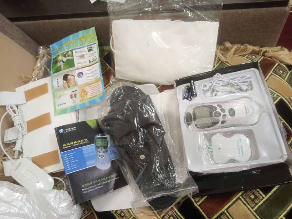 Массажёр для ног с электроподогревом.