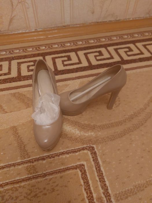 Продам новые туфли