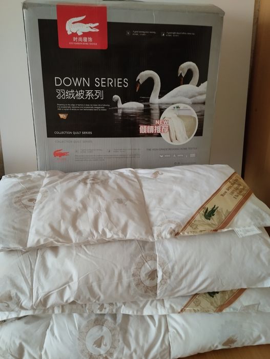 Одеяла пуховые два односпальных и одно двухспальное новые