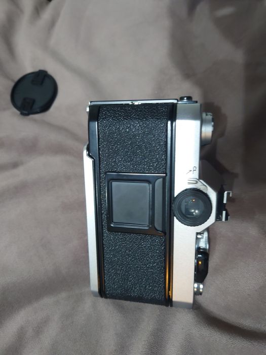 SLR Konica Autoreflex T3 (N} cu obv Hexar AR 28mm