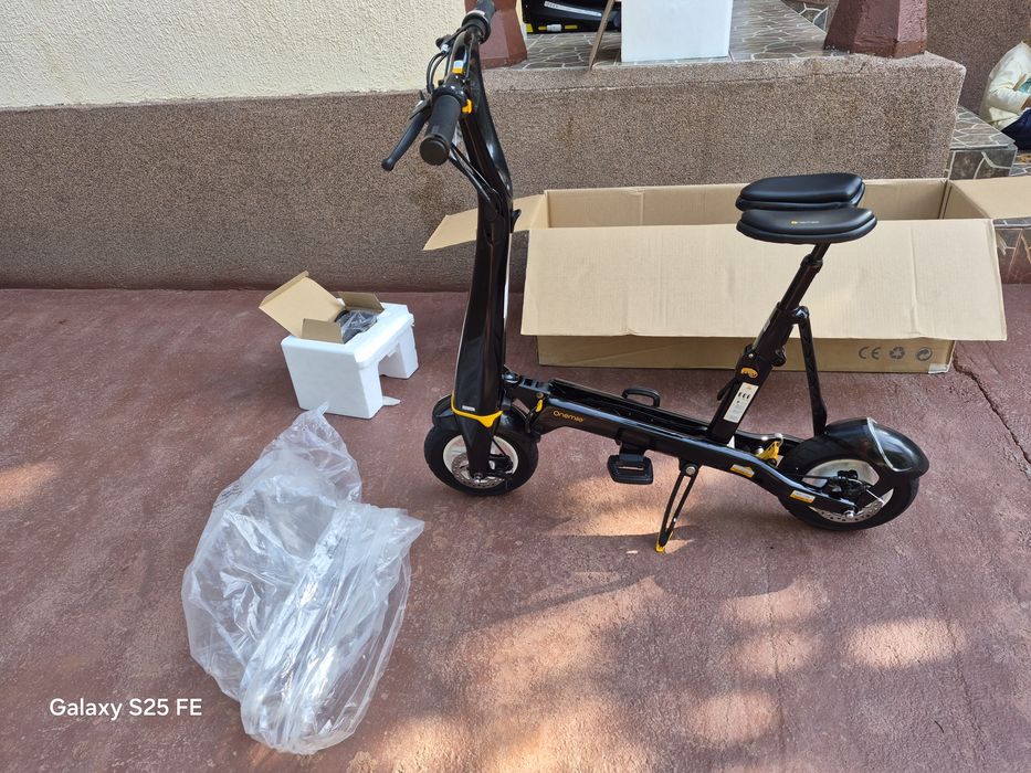 Bicicleta/Trotineta electrica, Carbon, viteza max 25/kmh, autonomie 35km incarcare .Pret 2700ron.este Noua