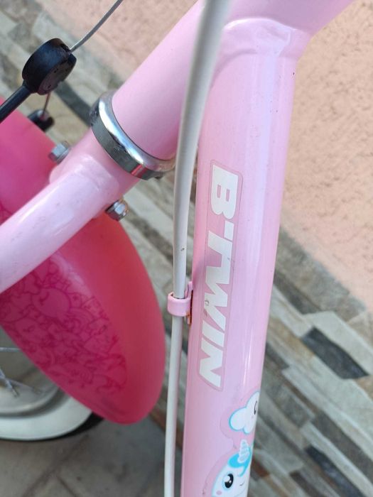 Bicicleta de copii 3-5 ani, de fete, marca Btwin. De 14 inch