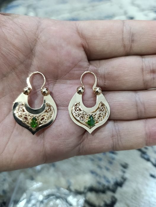 Тилла балдок зирак, чиройли кузли тош, проба 583, вес 5,76.