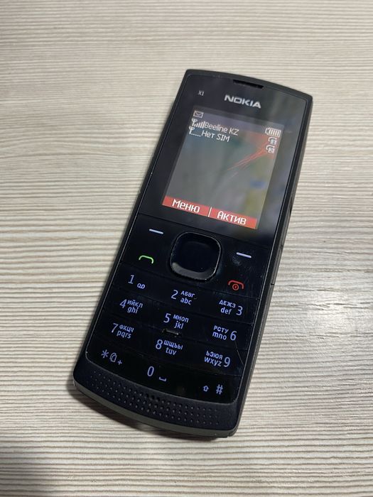 Телефон Nokia X1 + зарядка