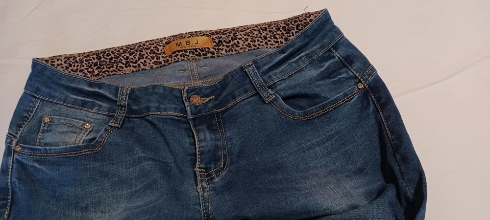 Blugi elastici sckiny sigaretta cu insertii leopard 44-46