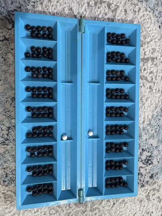 Тоғызқұмалақ ойыны