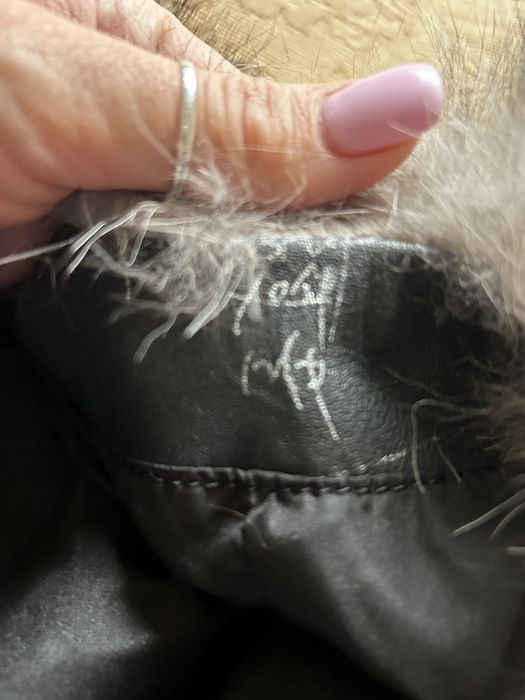 Жилетки кожанные