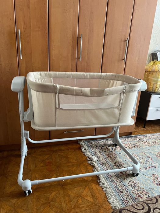 Электронная кроватка манеж