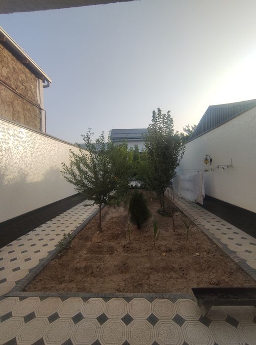 Мирзо Улугбекский район массив Феруза евродом 4,1-сотки 6-комнат.