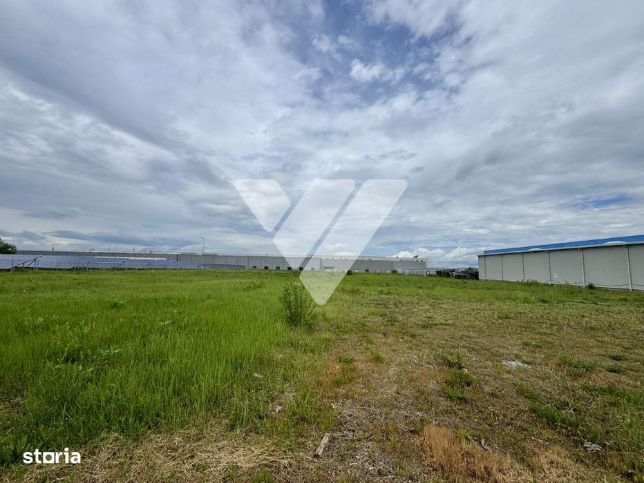 Teren intravilan industrial 11.059 mp, PUZ aprobat, asfalt - zona Vest