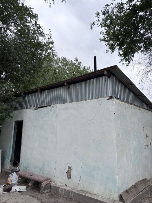 Дом в ушжарме(полдома)с магазином