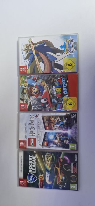 Nintendo Switch cu accesorii multe + 4 jocuri