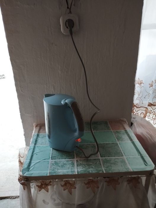 Тифал чойнак сотилади холати яхши ишлайди  оладиган  тел килинг сотама