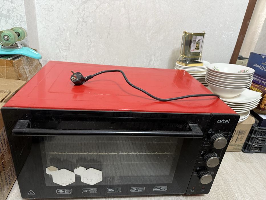 Продам духовку Artel