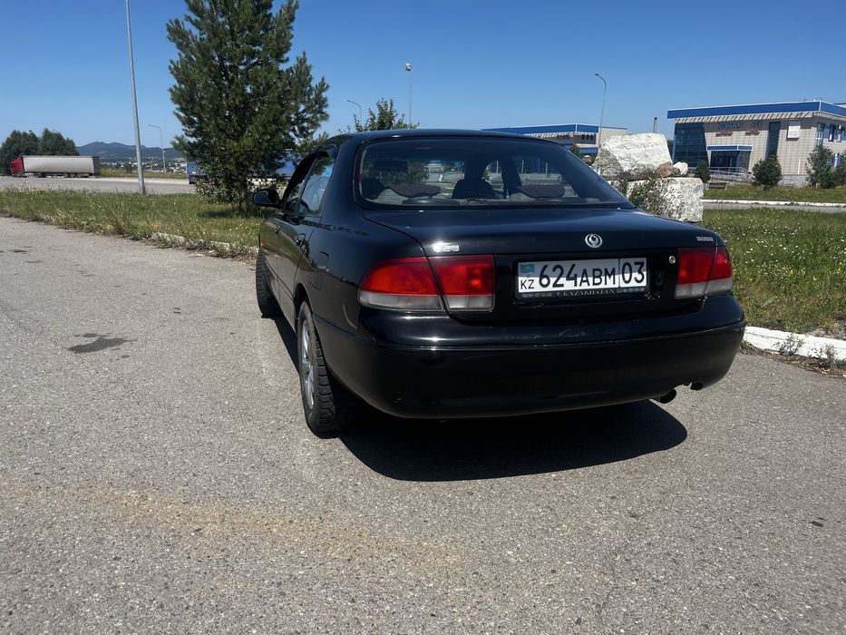 Продам мазду кронос