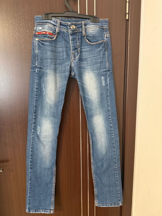 Дънки на марката GUCCI