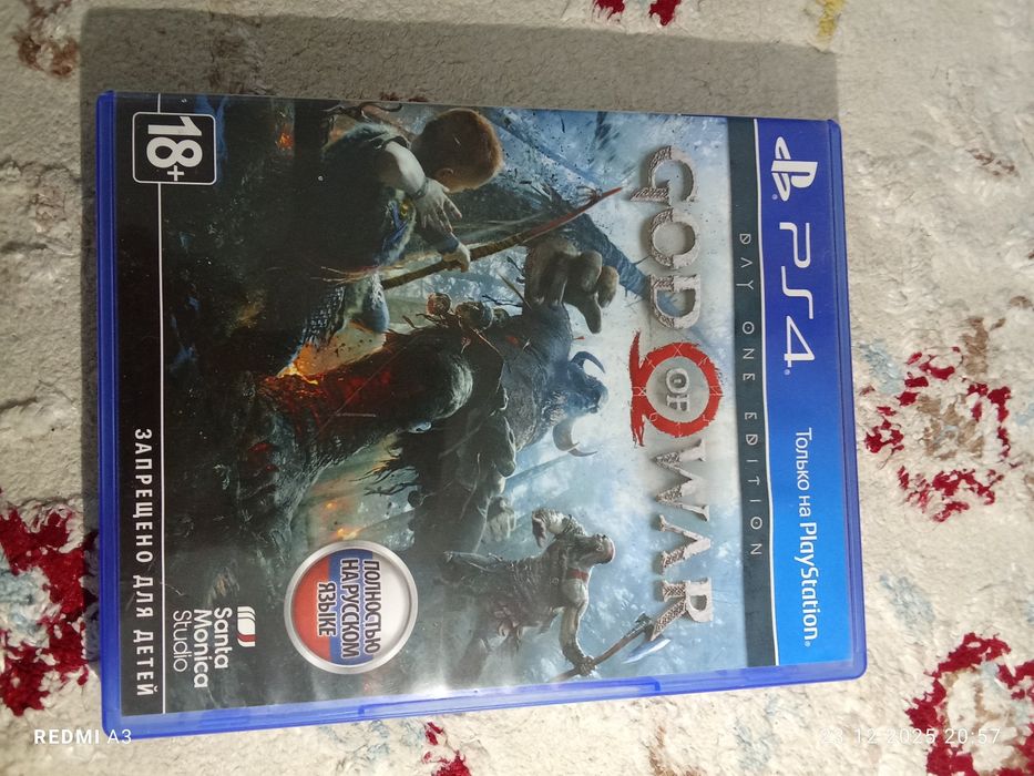 Диск god of war на PlayStation 4