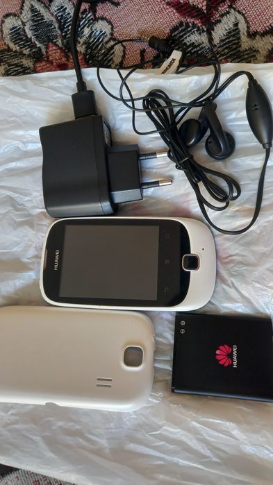 Vand mobil Huawei Ascend y100, alb, mic si usor,baterie originala