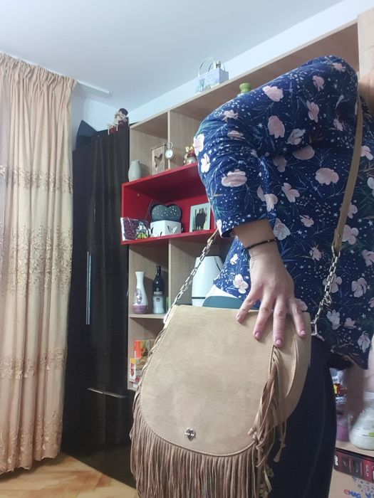Geanta piele motivi