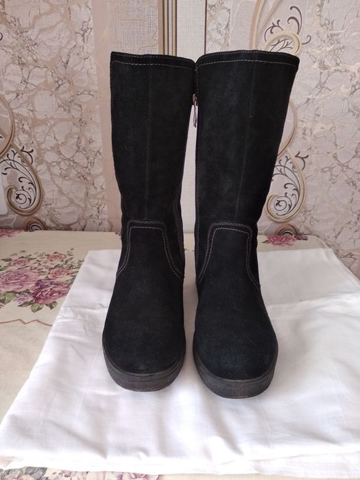 Новые зимние сапоги.