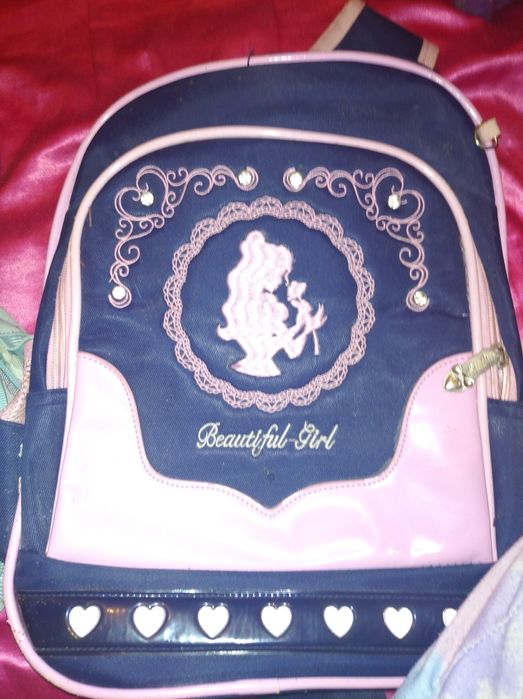 Рюкзаки школьные всё целое