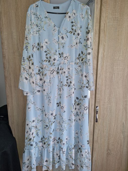 Rochie mărimea 48-50 din voal în stare buna