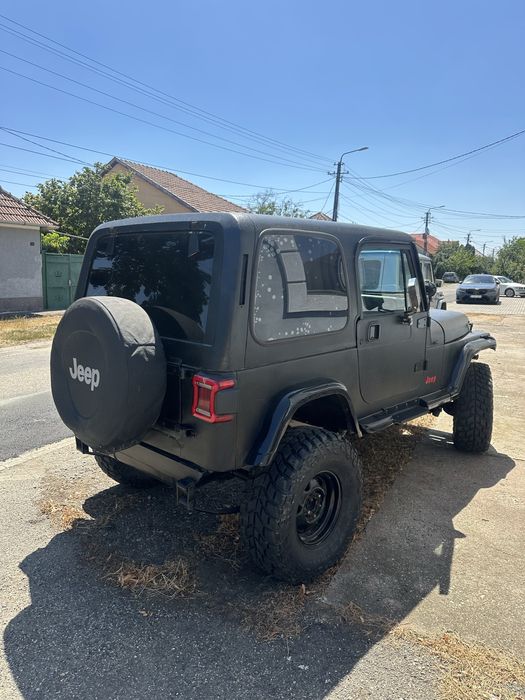 Vand Jeep Wrangler sau schimb cu Rolex