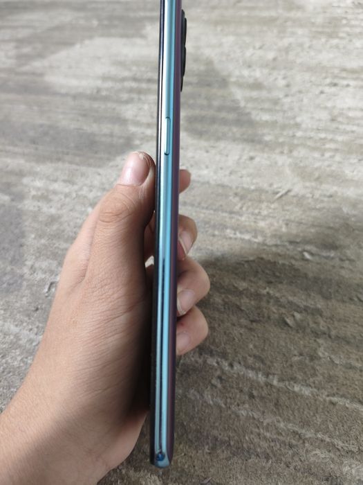 OPPO Reno4 Lite в бирюзовом цвете