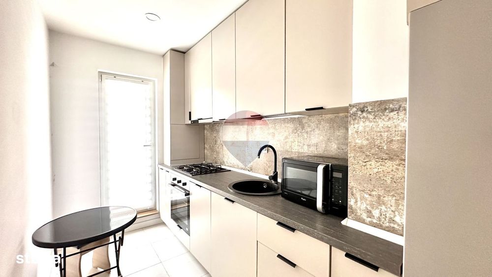 Apartament 2 camere Cosmopolis Q17 vedere la piscina