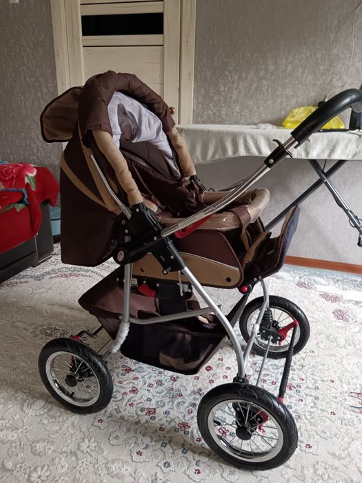 Большая коляска новая