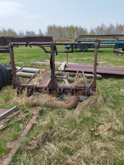 Продам косилку с граблями.