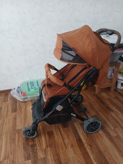 Коляска.    Кидило.