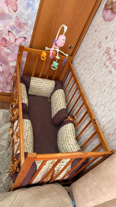 Продам детскую кровать с маятником