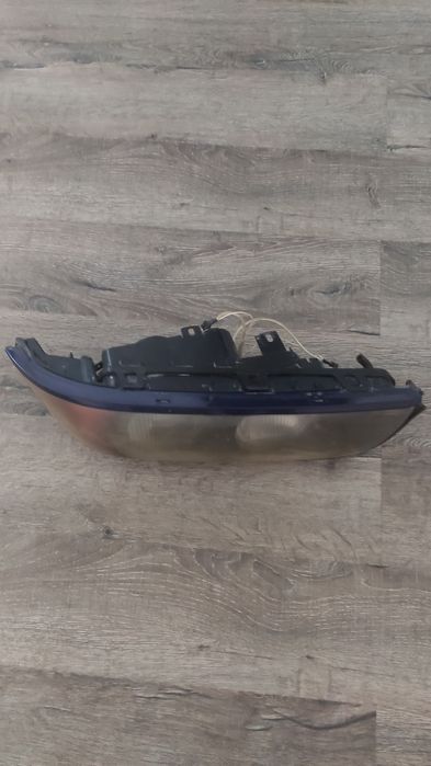 Фара   на BMW левая со стеклом