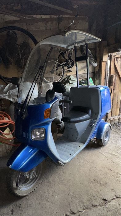 Трёхколёсный скутер Honda