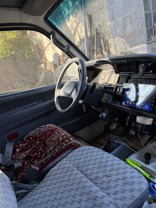 Машина Тойота Hiace