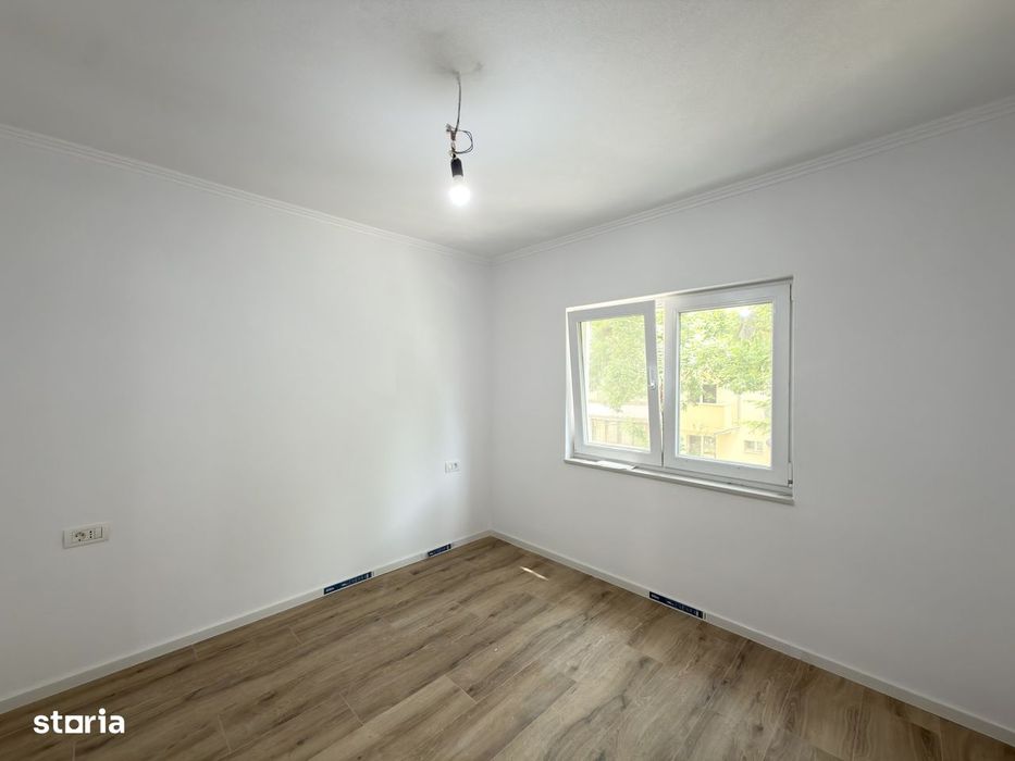 Apartament cu 3 camere, decomandat, 65mp, etaj 1 - zona Dambovita — fotografia 3