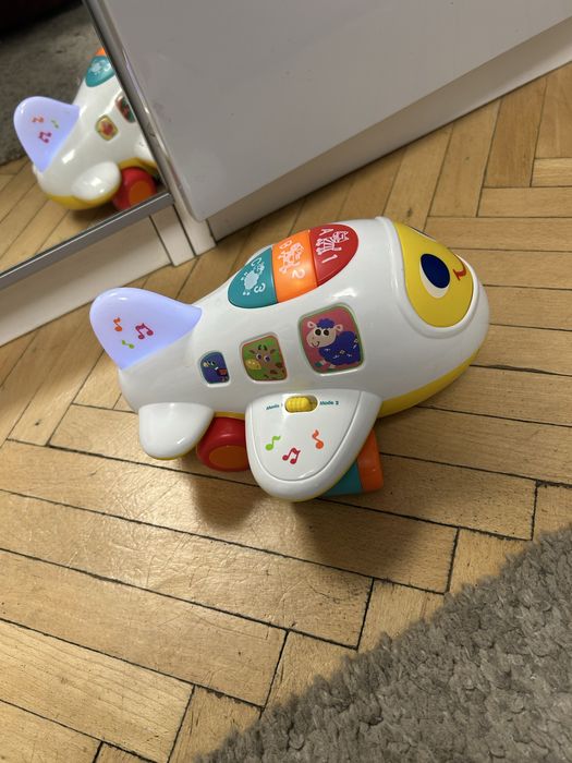 Jucarie interactiva bebe - Avion cu muzica si lumini in limba engleza