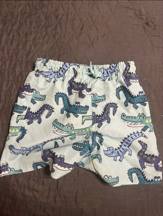 2 perechi pantaloni plajă mărimea 122 cm + o pernă gonflabilă Coca-Cola