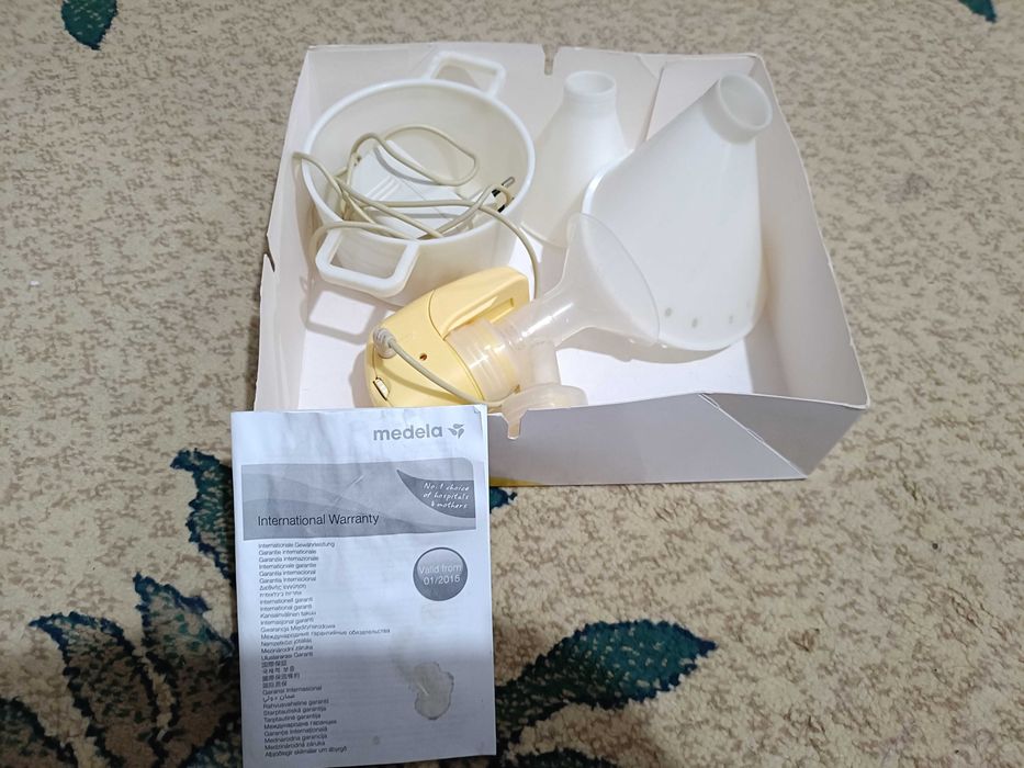Электрический молокоотсос модель Medela Mini Electric