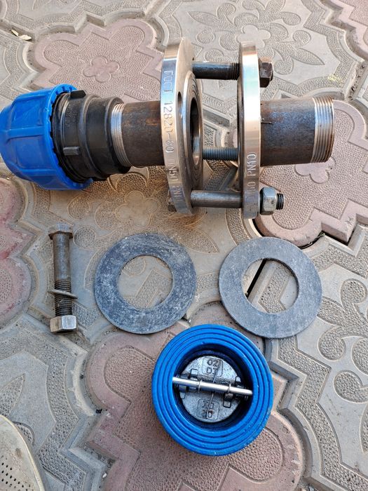 Продам обратный клапан в комплекте новый