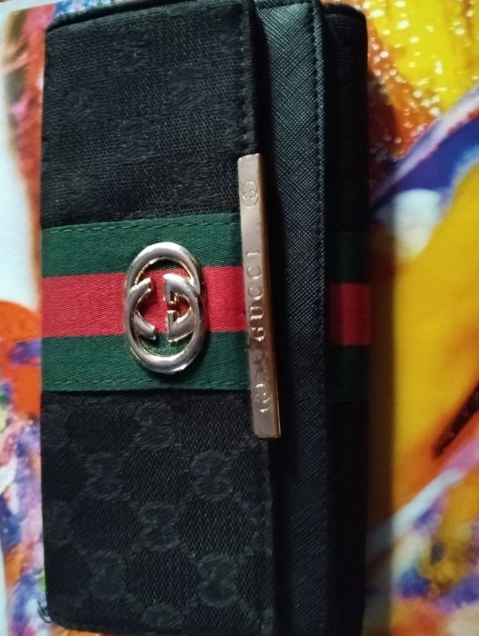 Portofel gucci  in stare foarte buna