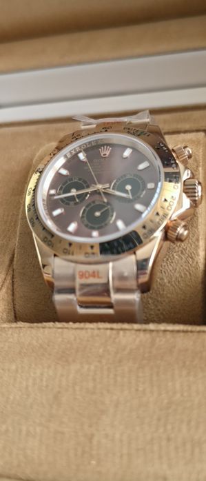 Rolex daytona gold