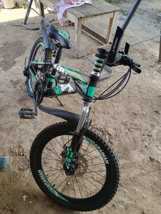 Giant Caraiman 20"frâne disc 21 viteze 7 și 12 ani.