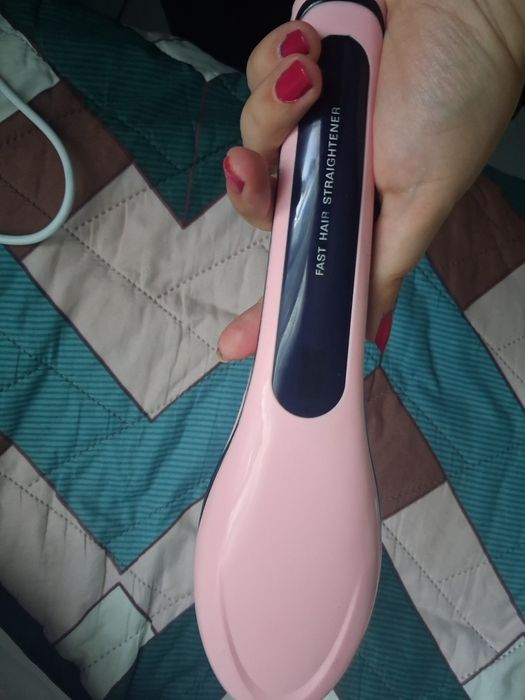 Нова четка  за изправяне на коса