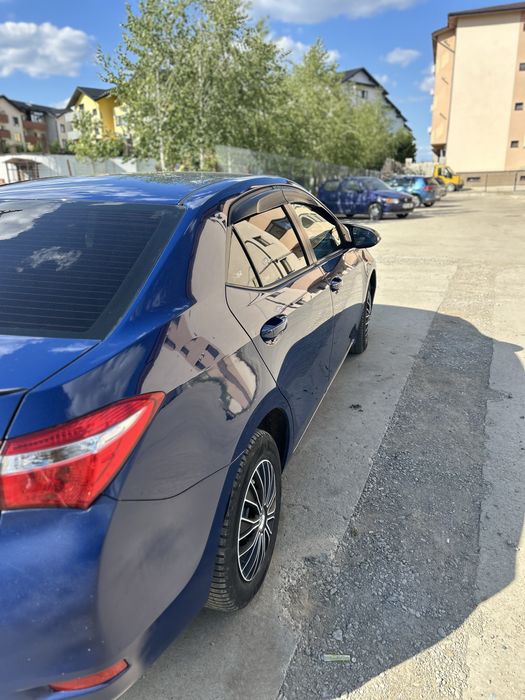 Vand Toyota Corolla an 2014, motor 1,4 benzina